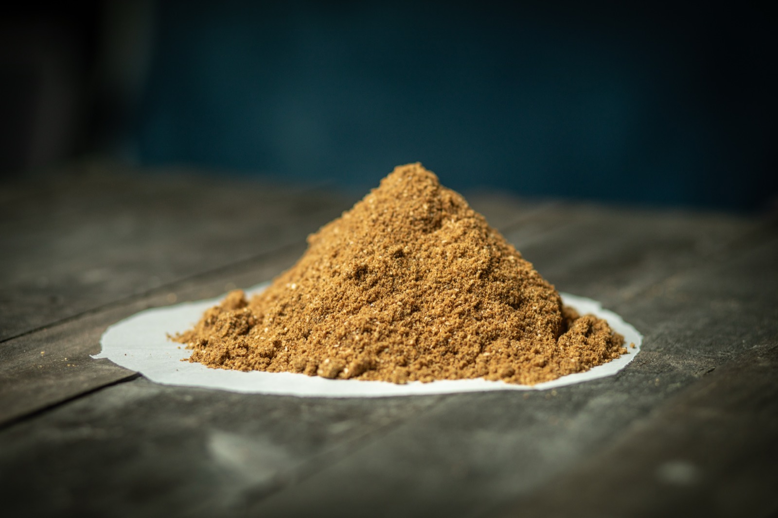 Ground fish meal on parchment