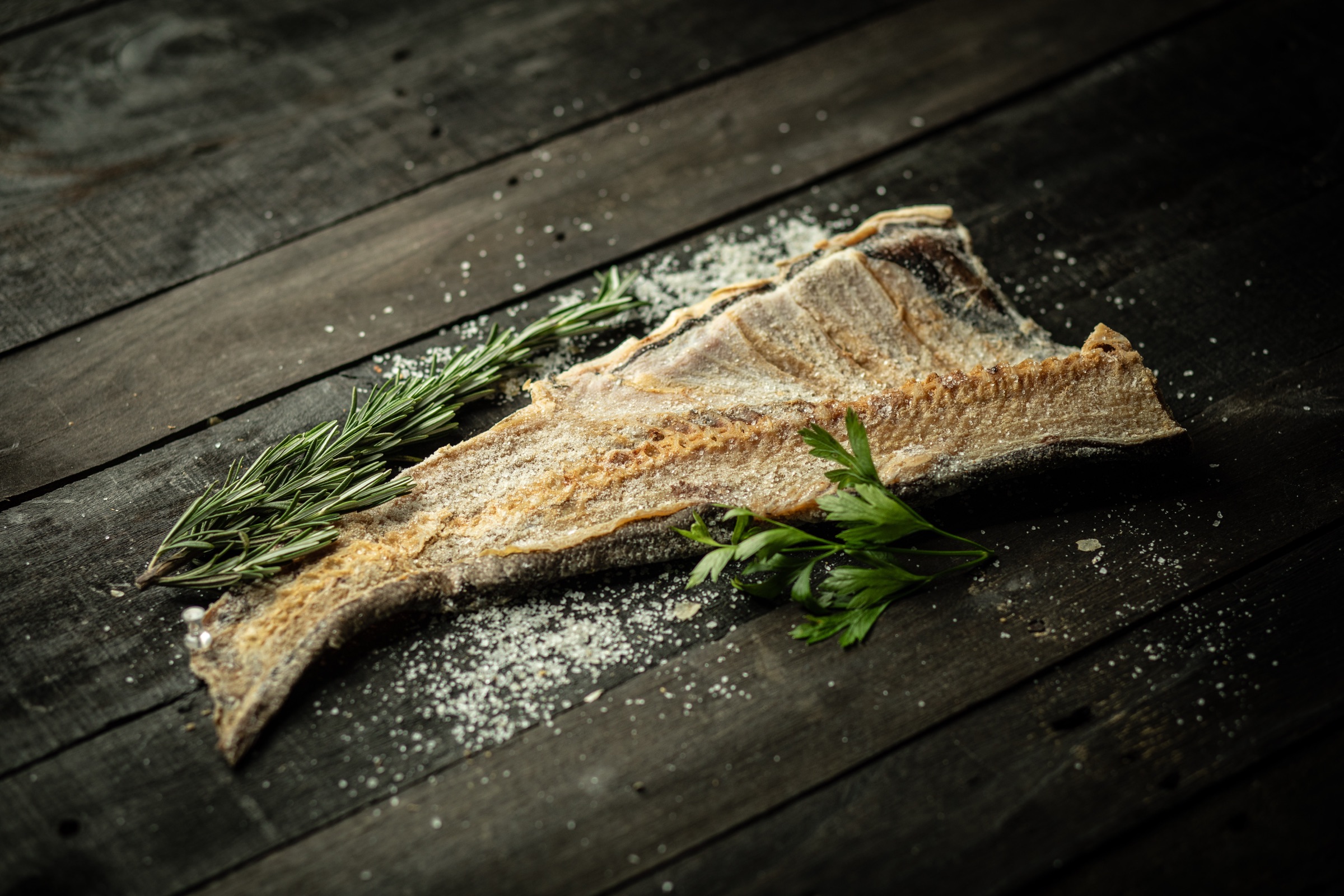 Wild-caught Asian carp fillet prepared with rosemary and sea salt
